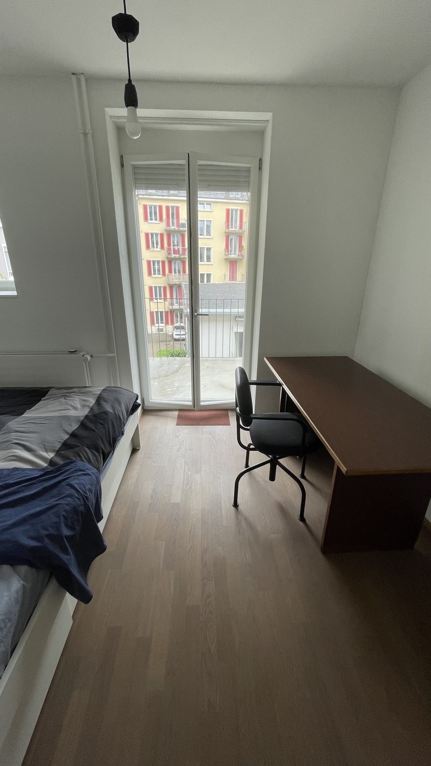 Camera in un appartamento condiviso